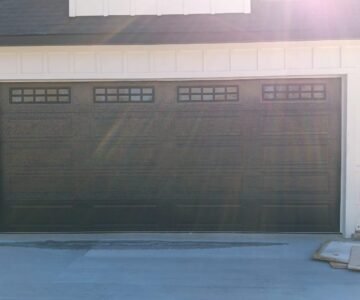 "Expert garage door repair services provided in the 77040 Houston area, showcasing a professional working on a garage door."