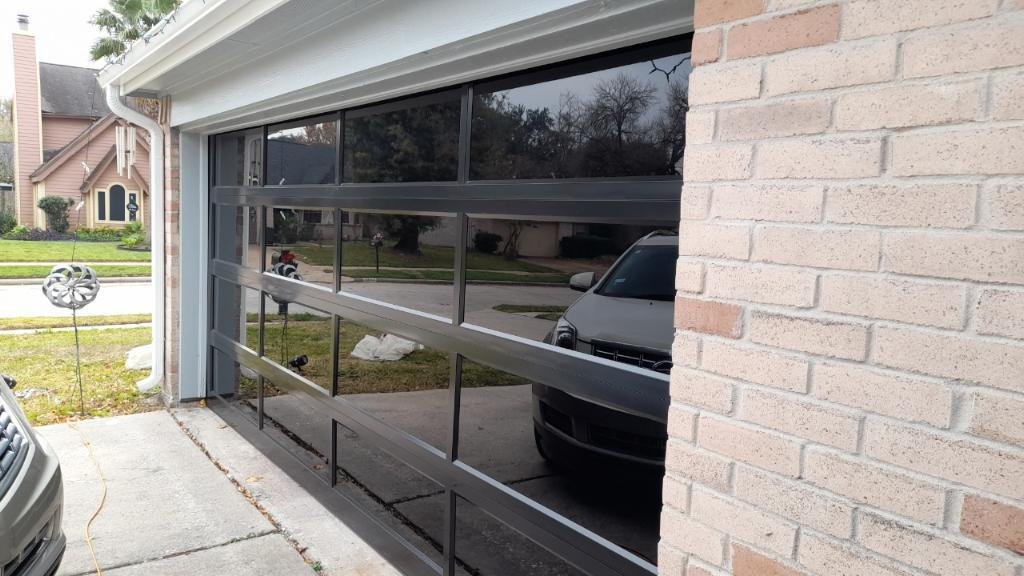 "Top-rated garage door repair services near the 77040 area, showcasing a high-quality, well-maintained garage door."