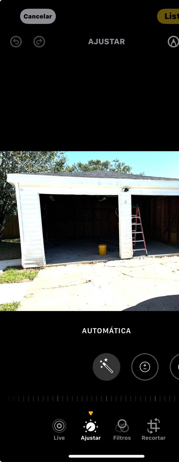 "Technician performing garage door repair services in Houston, TX, showcasing the high-quality work of LeMus Garage Door Service."
