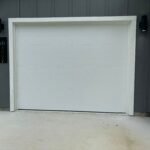 "Newly installed residential garage door in Houston, TX by Lemus Garage Door Service."