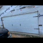 "New garage door installation in Houston by Lemus Garage Door Service."