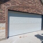 "Newly installed garage door in a Houston home, provided by Lemus Garage Door Service."