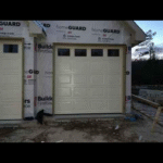 "Newly installed modern garage door in Houston by LeMus Garage Door Service."