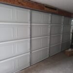 "Newly installed garage door by LeMus Garage Door Service in Houston, showcasing professional workmanship and quality materials."