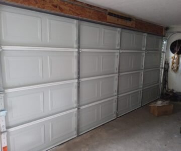 "Newly installed garage door by LeMus Garage Door Service in Houston, showcasing professional workmanship and quality materials."