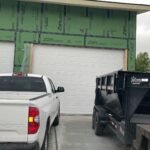 "Professional installation of a new garage door in Houston by LeMus Garage Door Service."