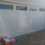"New garage door installation in Houston by Lemus Garage Door Service."